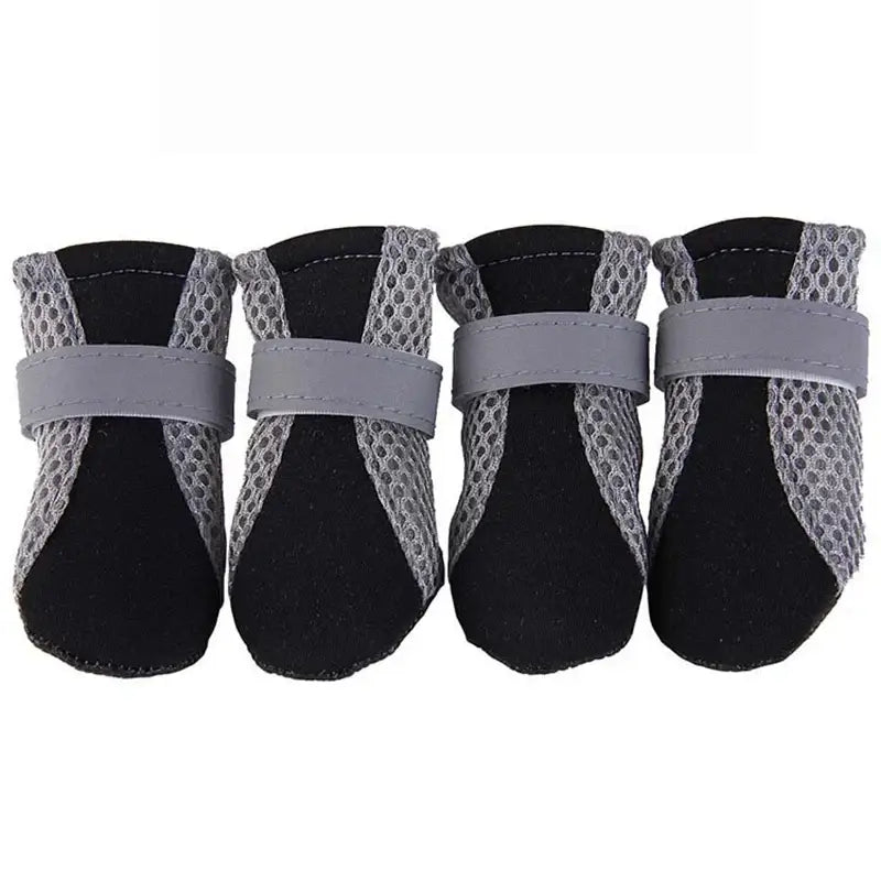 Breathable waterproof dog shoes designed for comfort and safety during outdoor activities for small and medium dogs.