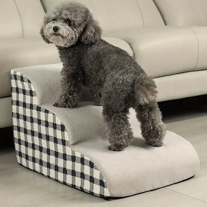 Small dog using pet stairs for small dogs, 2/3 step foam ramp designed for small senior dogs and safety.