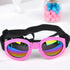 Pink dog sunglasses with rainbow lenses and adjustable strap, foldable pet goggles for summer sun and wind protection