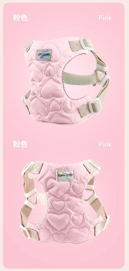 Pink waterproof puppy harness with heart quilted design, adjustable straps, and quick release for small to large dogs