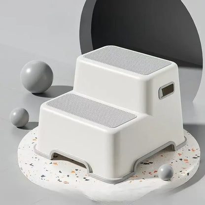 Portable dog stairs for small breeds made of durable plastic with a non-slip surface, designed for easy pet access.