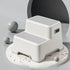 Portable dog stairs for small breeds made of durable plastic with a non-slip surface, designed for easy pet access.