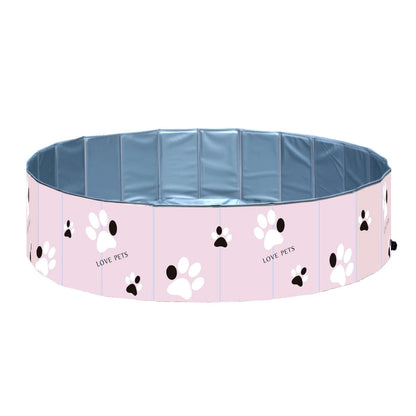 Portable dog swimming pool tub featuring a round design with paw prints and a blue inner liner.
