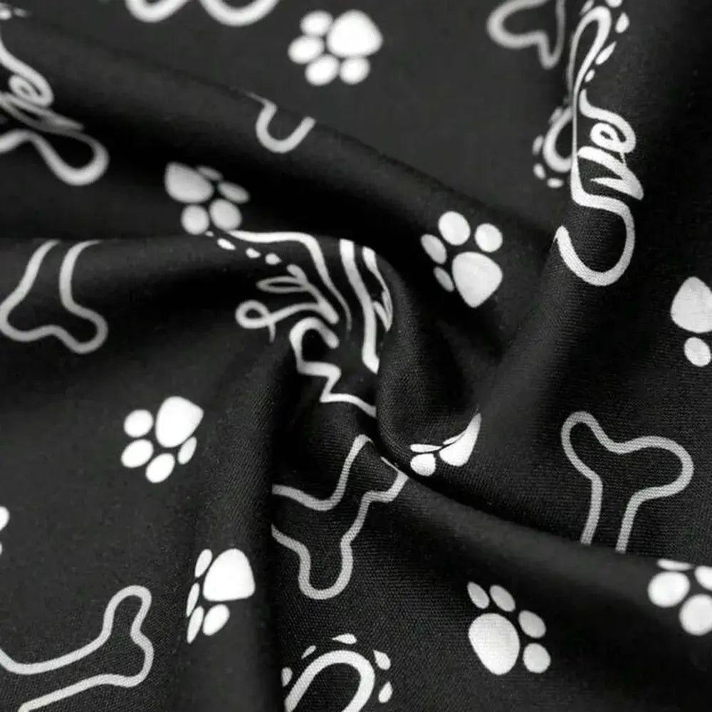 reversible dog bandana black fabric with bone and paw print pattern for small dogs
