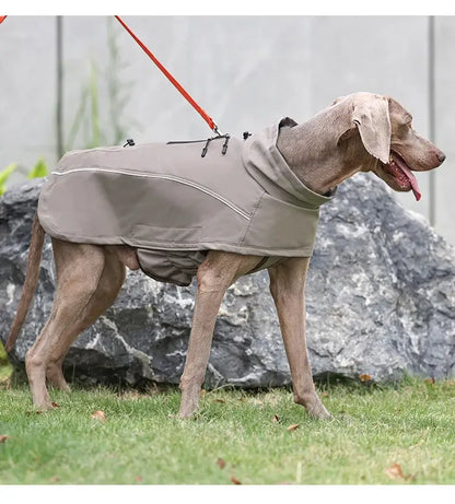 Waterproof dog jacket for large dogs with reflective soft shell fleece lining, shown on a large dog outdoors