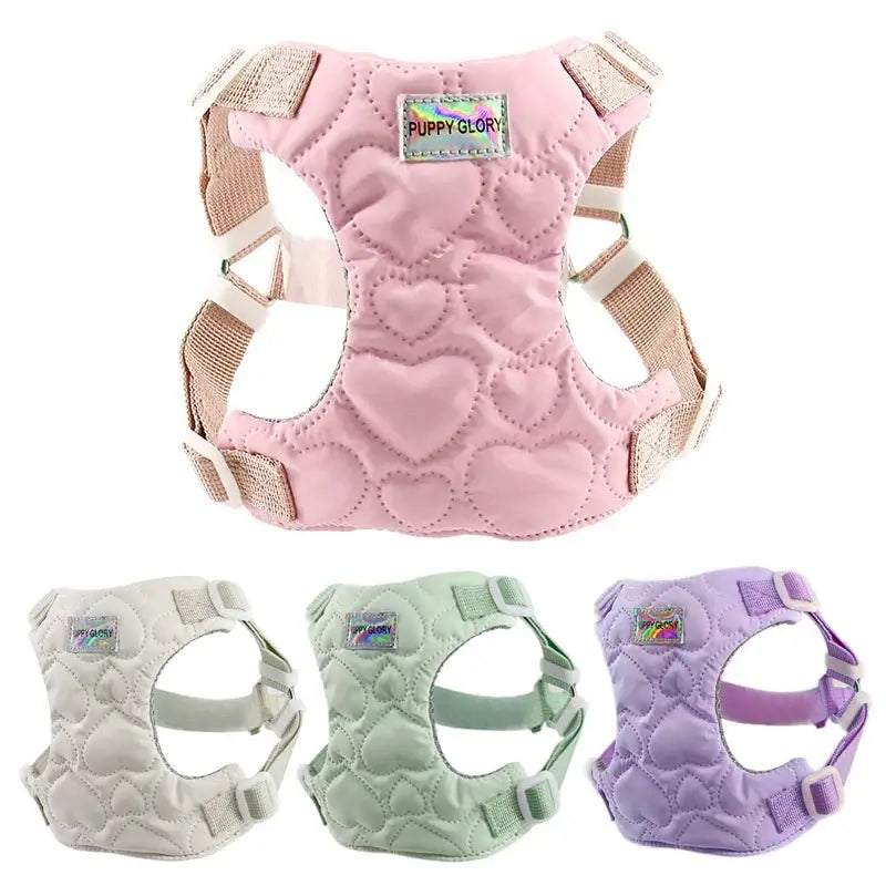 Pink waterproof puppy harness with heart pattern and adjustable straps for small, medium, and large dogs