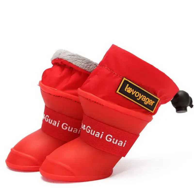 Waterproof dog rain boots in red color for small to medium dogs with adjustable straps and comfortable lining.